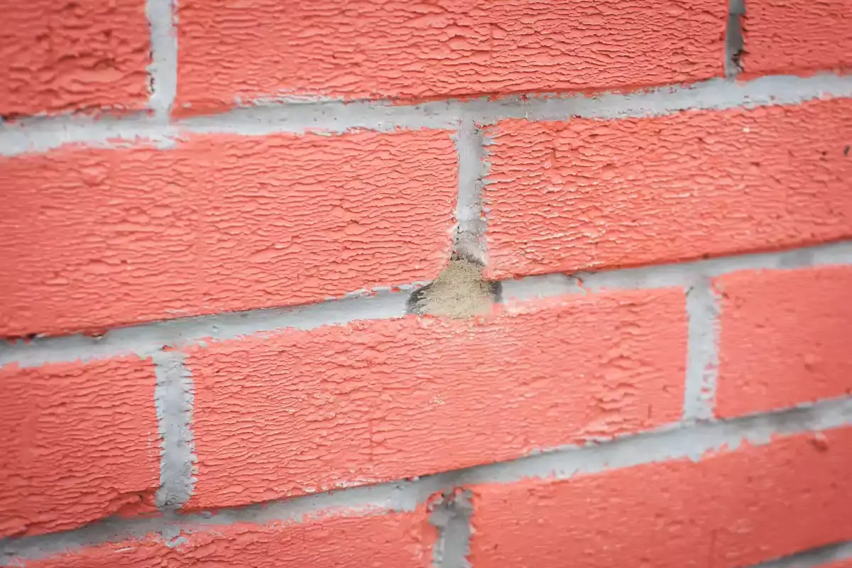 Hole Sealed After Wall Cavity Filled With Bonded Bead Insulation